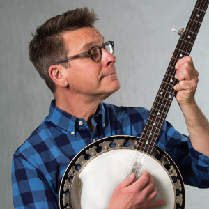 Award-winning musician, author, and child development specialist Jim Gill plays the banjo