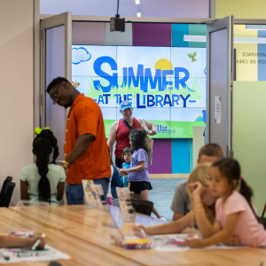 Patrons of all ages celebrate Summer at the Library with activities and community. 