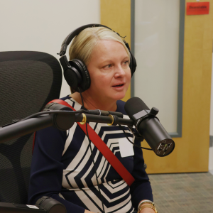 Library patron talks into a mic at the Northside Digital Studio