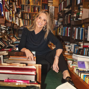 NYT Bestselling Author Patti Callahan Henry sits in a library of books smiling. Join LPL for a conversation about her latest novels, inspiration, and more on May 3rd at the Beaumont Branch