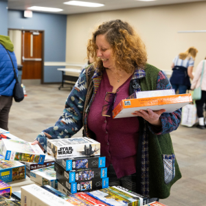 Patron gets new puzzles at the Puzzle Swap