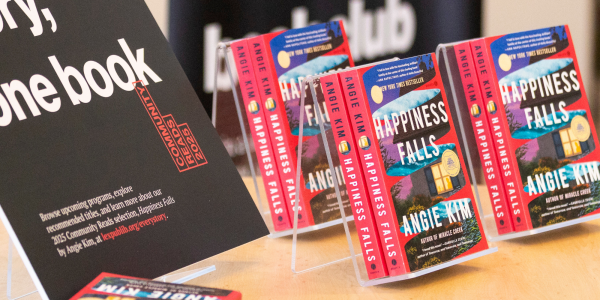2025 Community Reads selection "Happiness Falls" by Angie Kim display