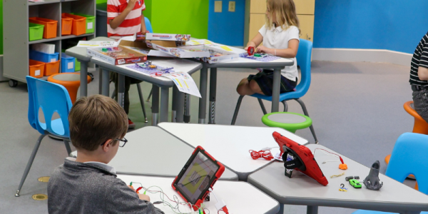 Children engage in hands-on activities at the Kloiber Foundation STEAM Lab, located on the fourth floor at Central Library offering science, technology, engineering, art, and math programs for youth and families.